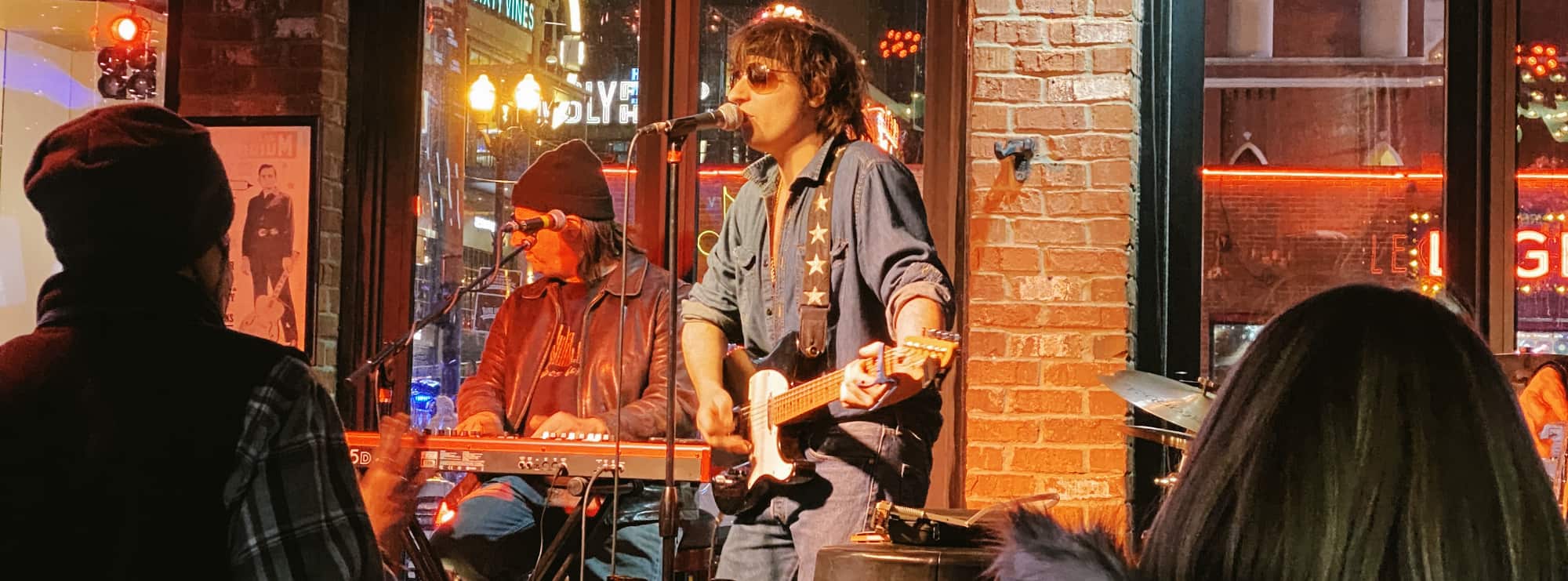 bar singer on guitar in Evansville
